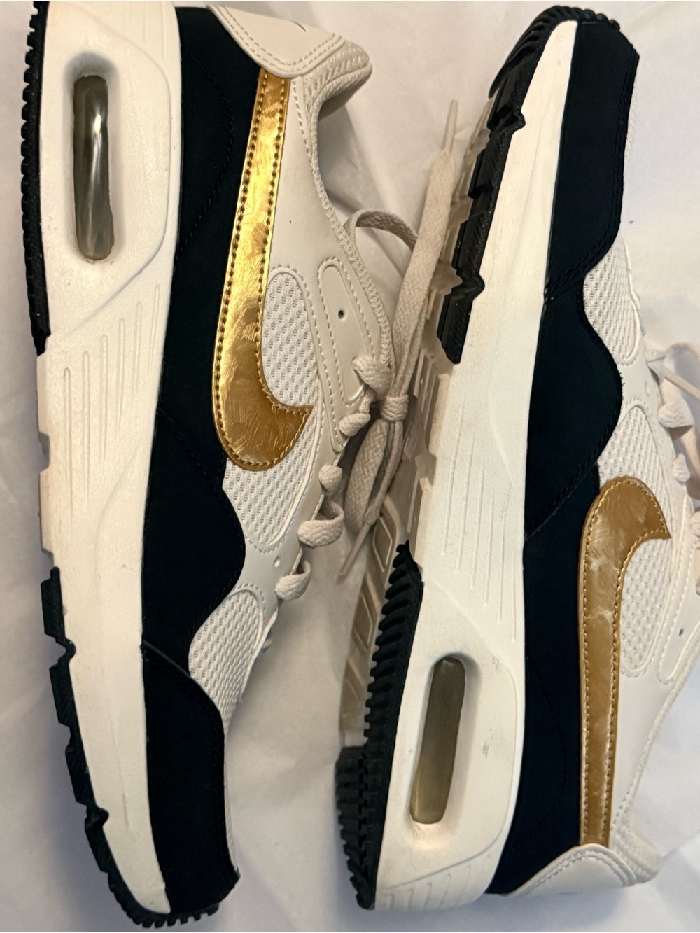 Nike Air Max White Black Sneakers with Metallic Gold Swoosh